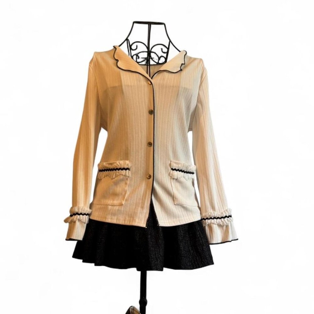 Cream and black vintage long sleeve blouse with ruffle details